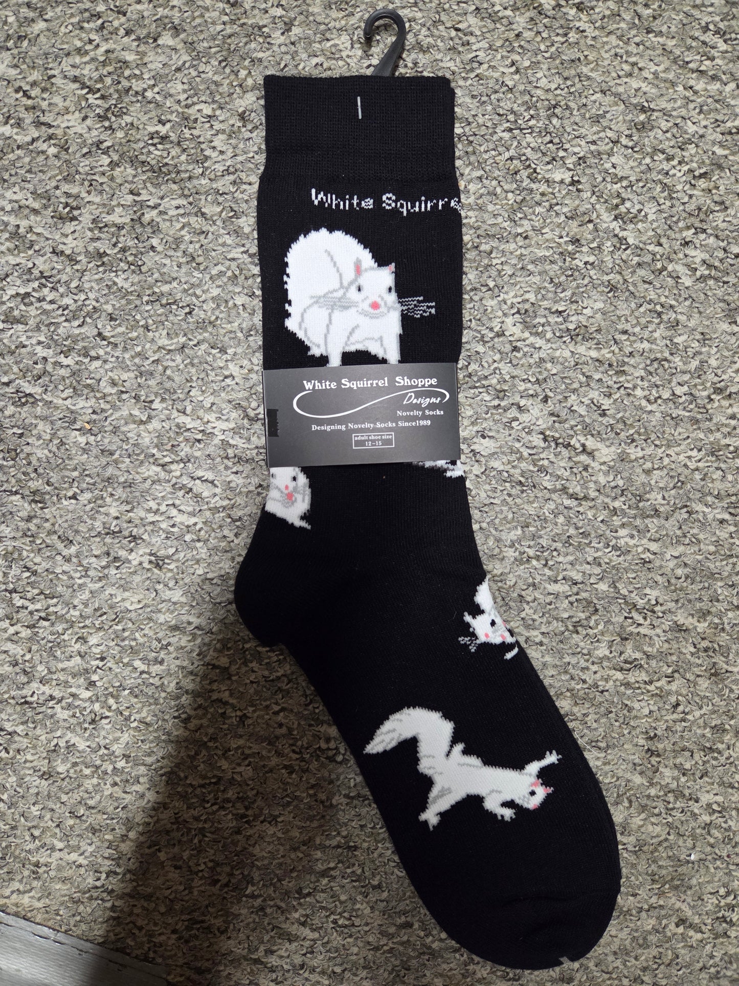 Men's plus size black socks with white squirrel design.
