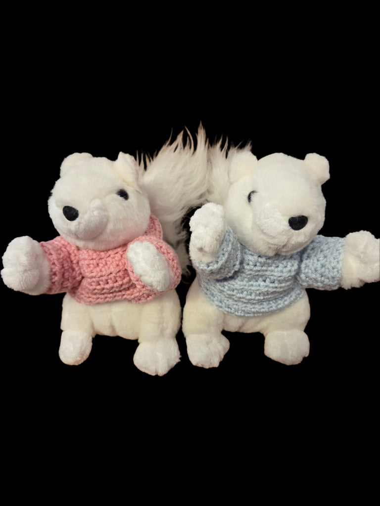 Black nose stuffed squirrel wearing colorful hand-crocheted sweater