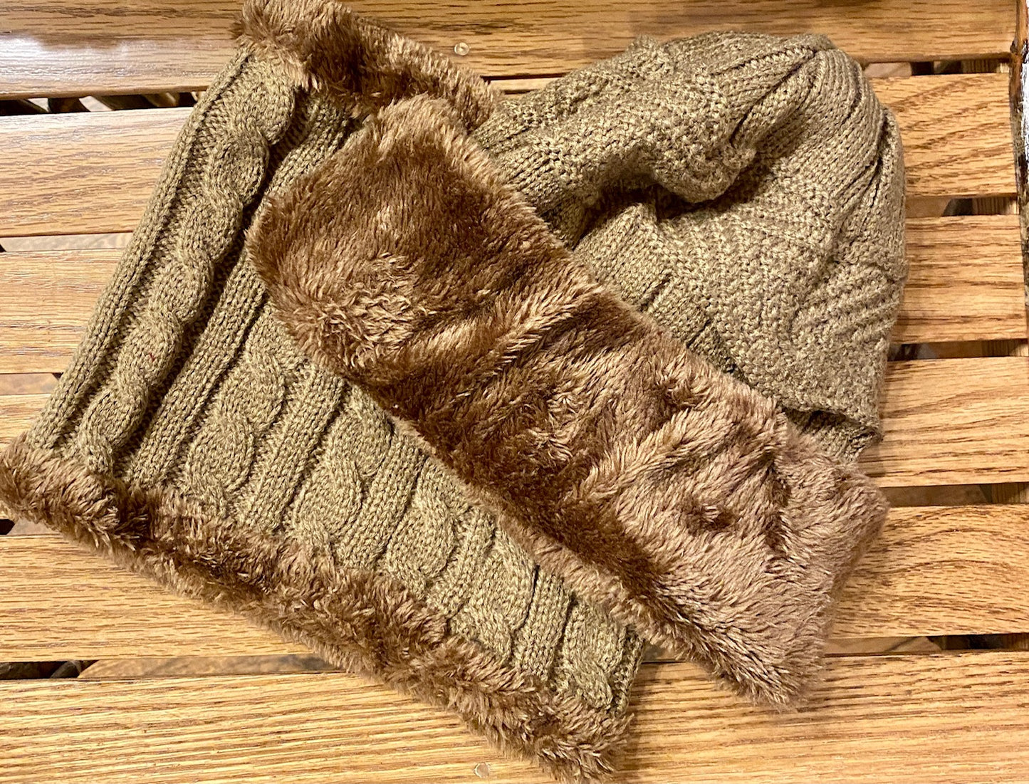Cable knit beanie and neck warmer with faux fur detail in tan.