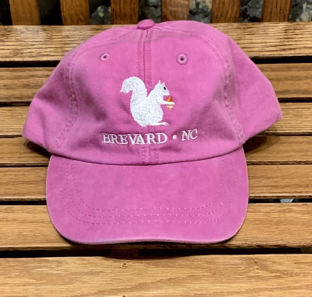 White Squirrel embroidered baseball cap from Brevard NC in raspberry pink color