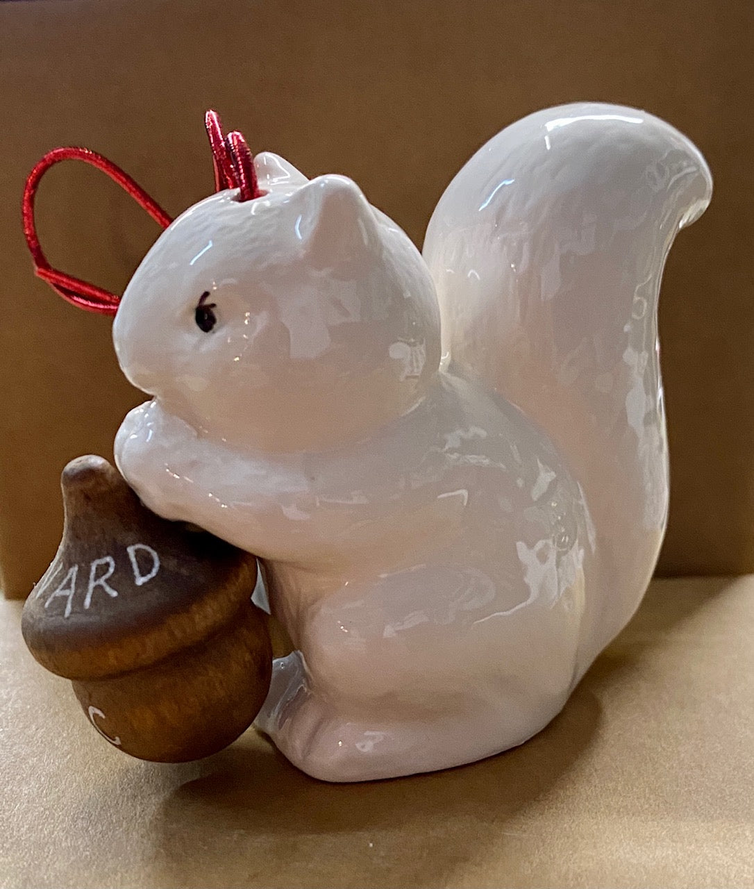 Ornament - Porcelain - Salt Shaker - White Squirrel Holding an Acorn with Brevard, NC
