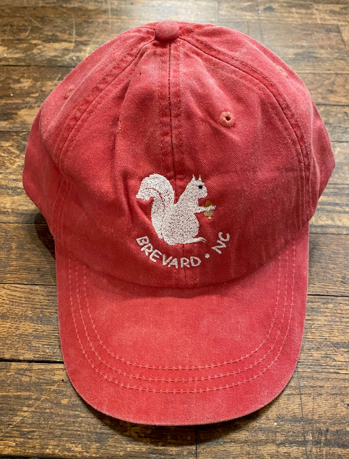 White Squirrel embroidered baseball cap from Brevard NC in nautical red color