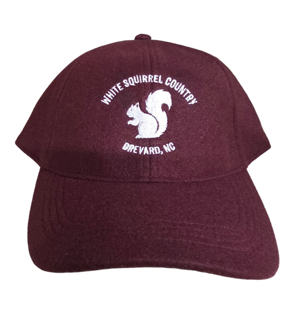 Burgandy cap with white squirrel logo and 'White Squirrel Country Brevard, NC'.