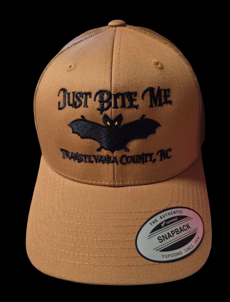 Coyote Tan cap with 'Just Bite Me Transylvania County, NC' embroidered