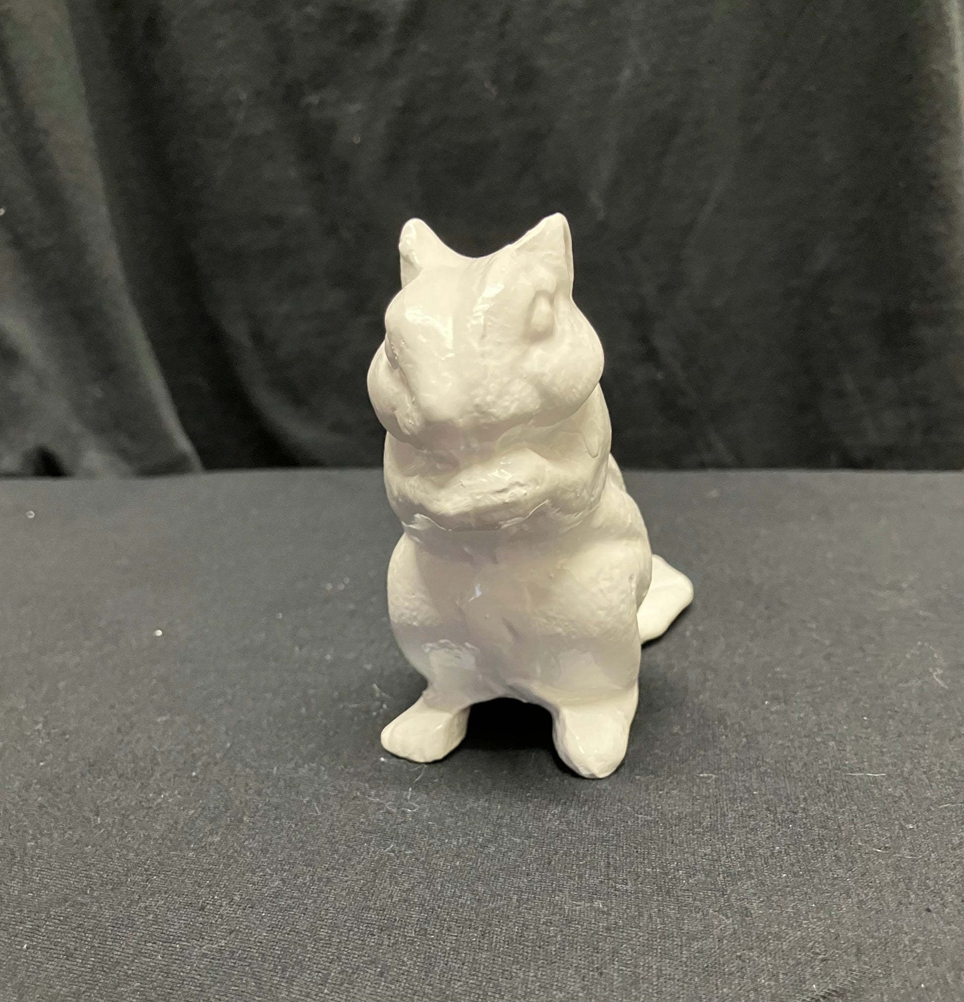 Front image white squirrel door stop
