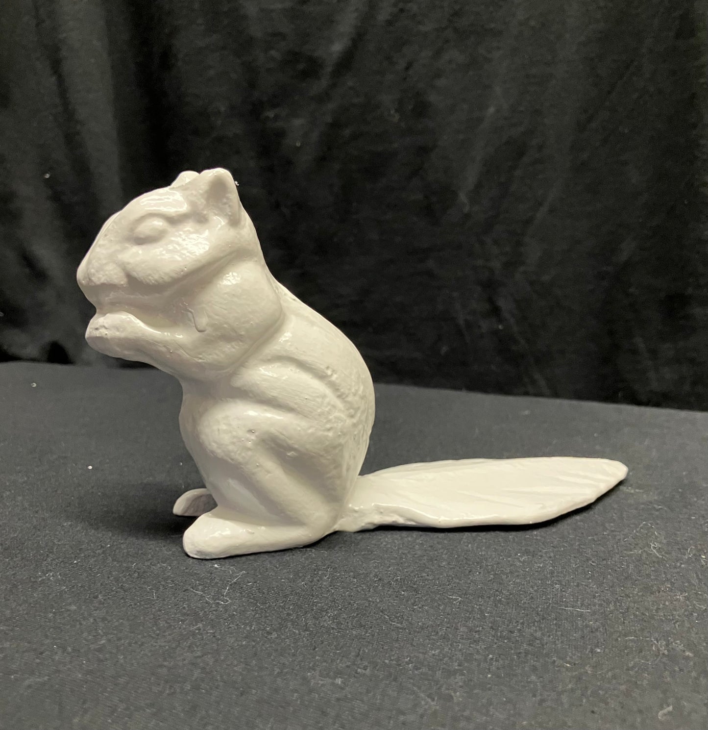 Left side white squirrel door stop