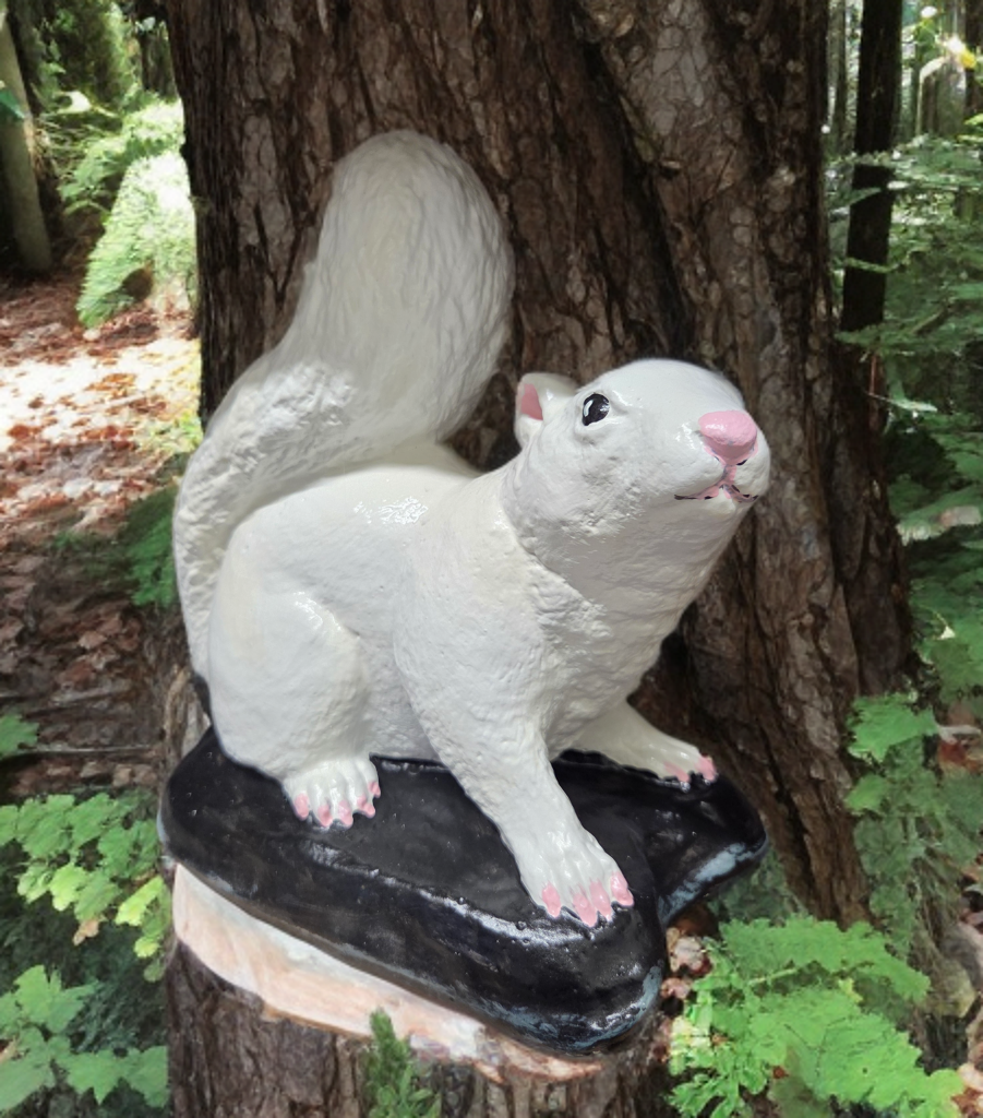 White squirrel figurine on a tree stump in a forest setting