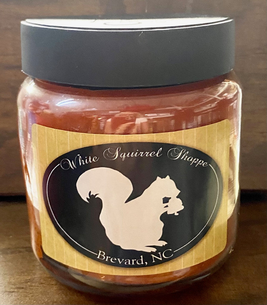 Candle - Maple Pumpkin Donut Scent in a Jar labeled White Squirrel Shoppe Brevard, NC