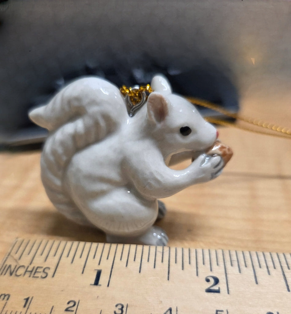 Ornament - Porcelain - White Squirrel Holding an Acorn - Hand Painted