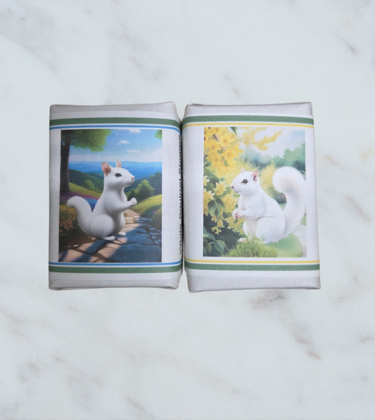 Images of two soaps in cute White Squirrel Shoppe packaging.