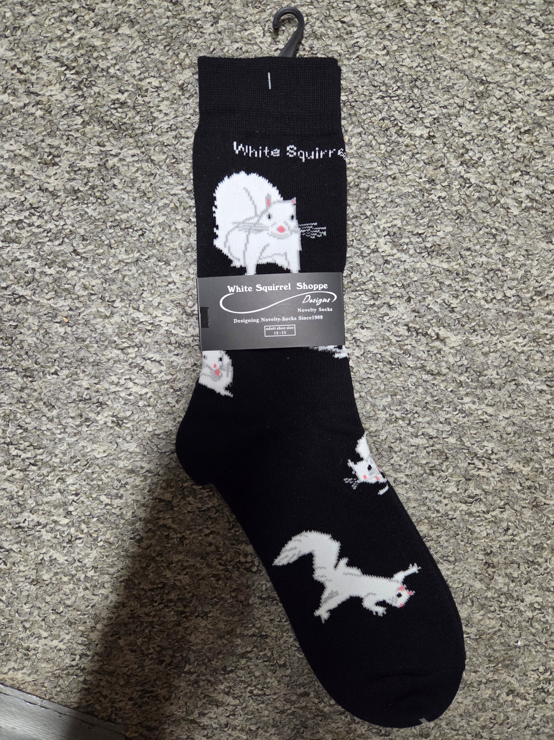 Men's plus size black socks with white squirrel design.