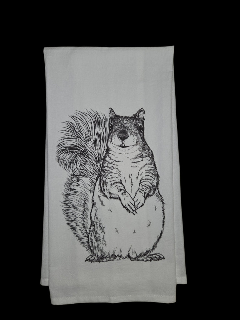 Tea towel with a black and white squirrel design on a white background