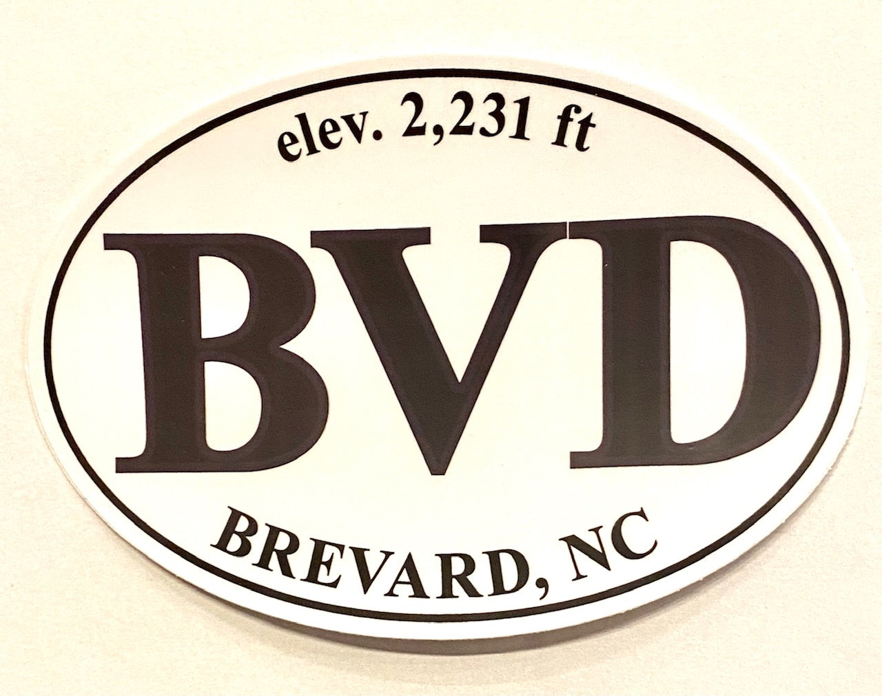Large white oval vinyl decal with the text 'BVD, NC - Elev. 2,231 feet' in black.