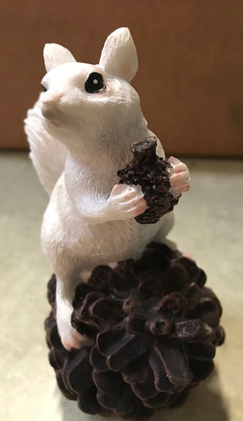 Resin - White Squirrel Figurine Perched on a Pine Cone