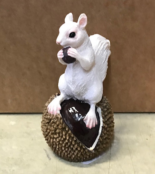Figurine - Resin - White Squirrel Perched on a Black Walnut