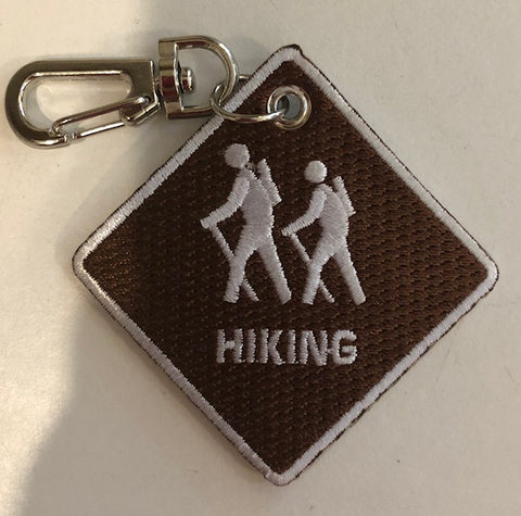 Key Chain/Clip - "Hiking" symbol on one side......our White Squirrel on the other side
