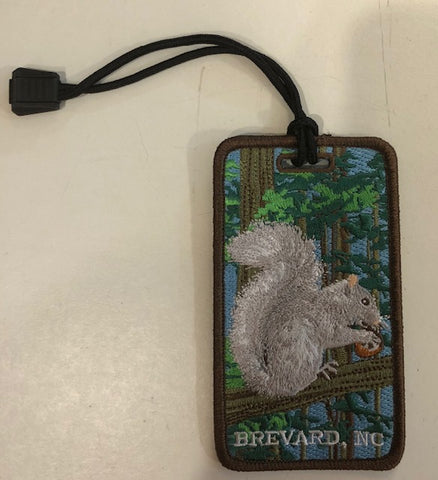 Luggage Tag - Our little White Squirrel and "Brevard, NC" Embroidered on Front