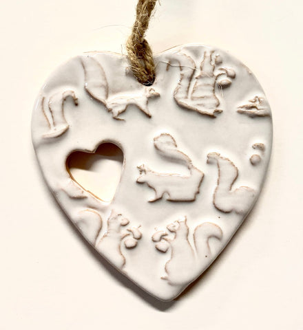 Ornament - Clay - Heart-Shaped with White Squirrels & Cut-Out Heart