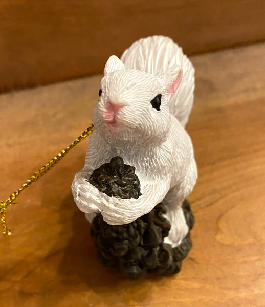 Ornament - Resin - White Squirrel Perched on a Pinecone or Acorn