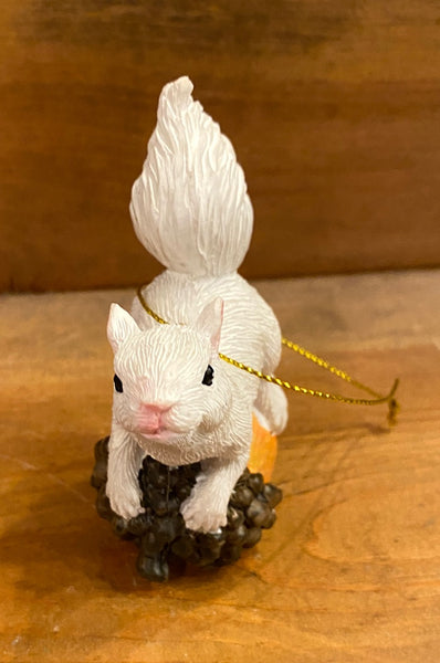Ornament - White Squirrel Perched on a Pinecone or Acorn in Resin