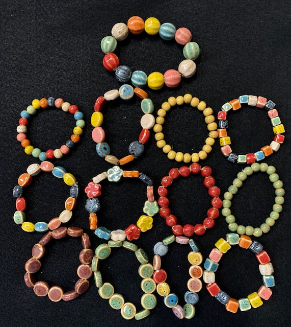 Colorful clay bracelets that can be used individually or stacked.  so beautiful and such a nice pop of color