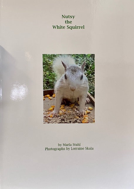 Nutsy the White Squirrel children's book by Marla Stahl with photographs by Lorraine Skala, the story of how white squirrels came to Brevard NC