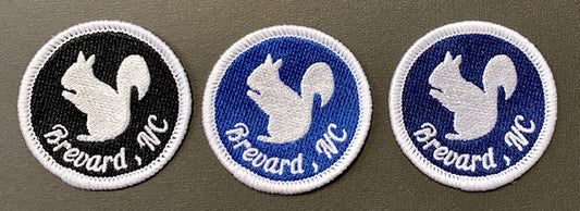 Choose one of these embroidered patches featuring a white squirrel on a round 2-inch circle. Which is your favorite? Blue or Black?