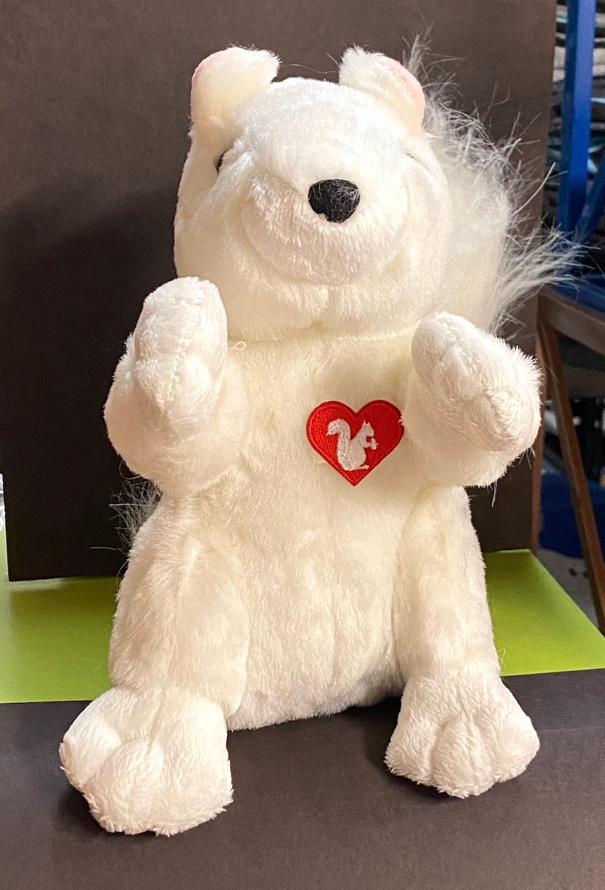 Our red embroidered heart with a white squirrel on it shown on one of our stuffed white squirrels (sold separately).