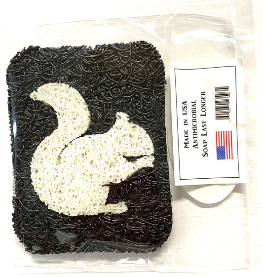 A black soap lift with a white squirrel design. Made in the USA.