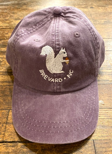 White Squirrel embroidered baseball cap from Brevard NC in wild plum color