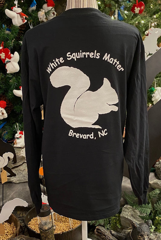 A black long-sleeve crew neck t-shirt with a white graphic of a squirrel and the text 'White Squirrels Matter Brevard, NC' on the front and back.